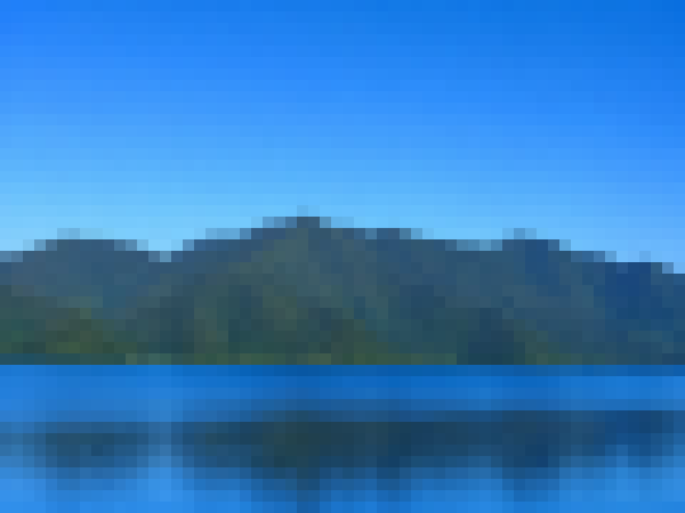 Lake photo pixelated with 16 pixel blocks